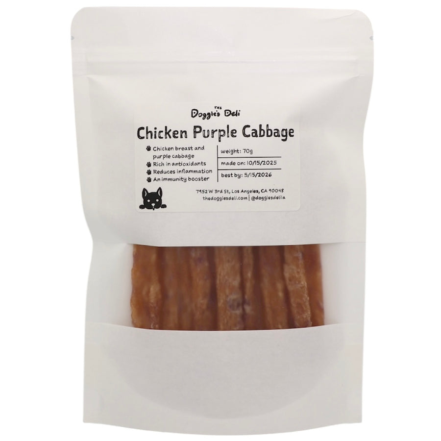 Dog treat package labeled 'Chicken Purple Cabbage' from 'Doggie's Deli' on a white background