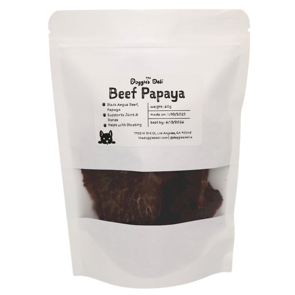 Package of Doggie Deli Beef Papaya dog treat with visible text and branding.