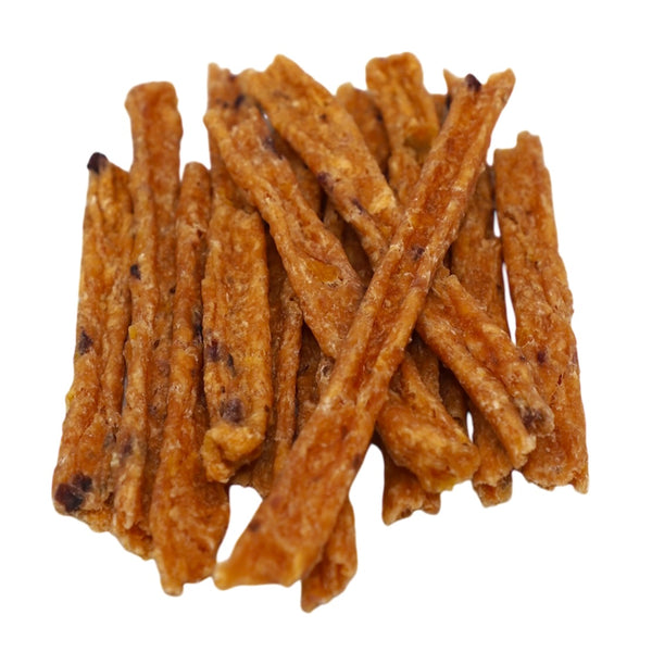Bunch of brown snack sticks on a white background