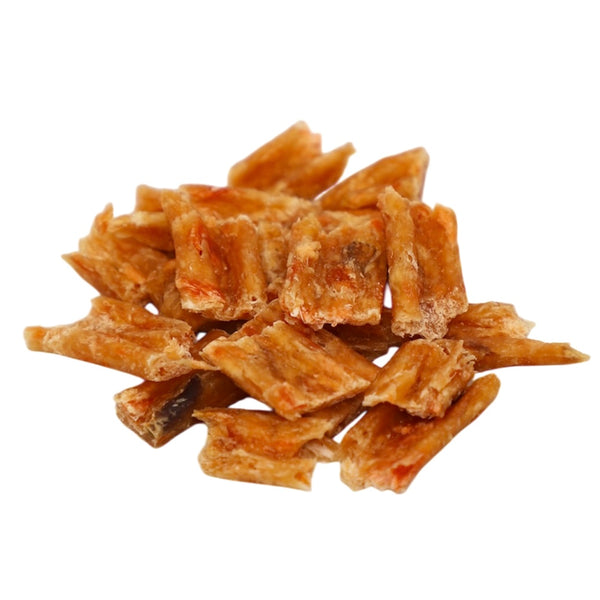 Dried fish pieces on a white background