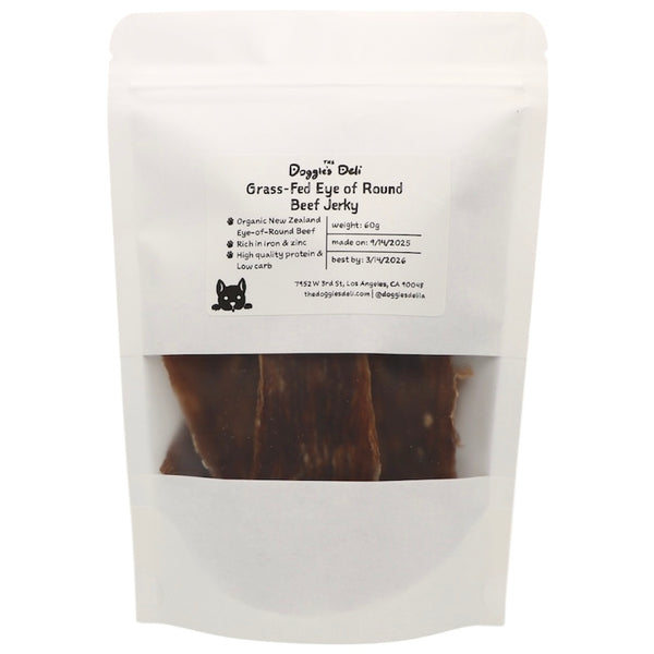 Package of Doggie Deli grass-fed beef jerky with a white background