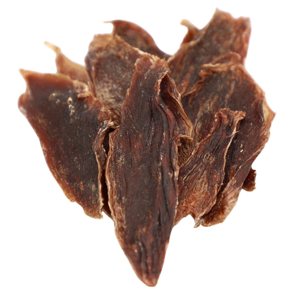 Close-up of a dried brown flower bud on a white background
