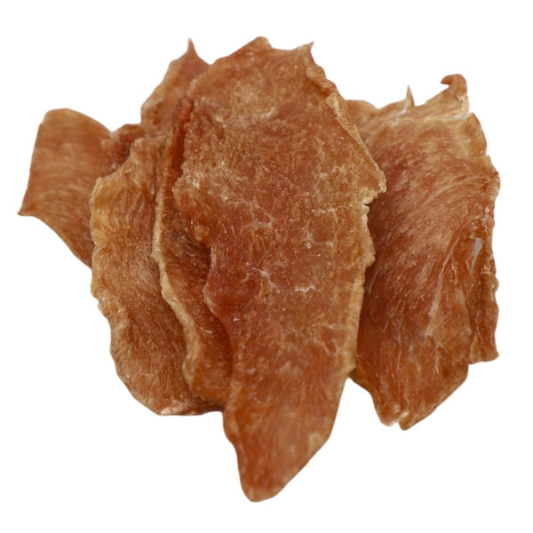 Three pieces of raw beef on a white background