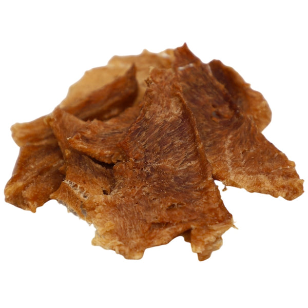 Brown dried pet treat on a white background