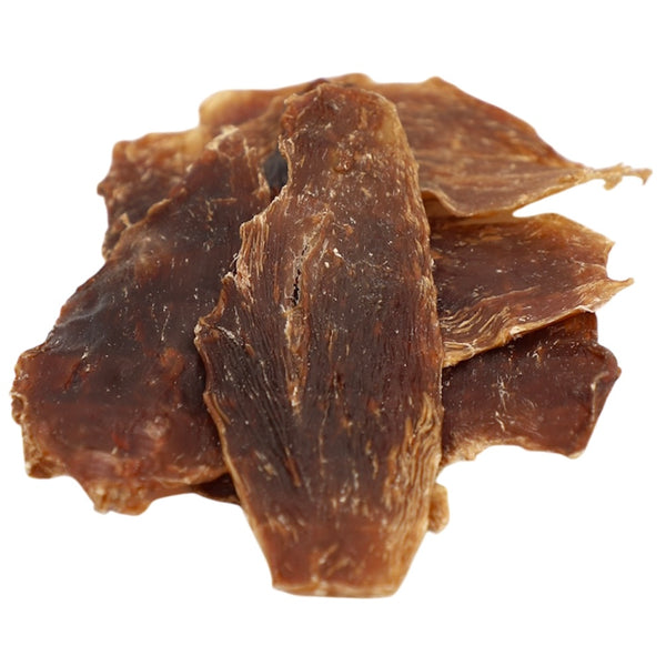 Close-up of dried brown leaves on a white background